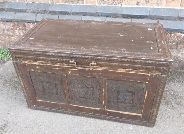 AN INDONESIAN STAINED WOODEN TRUNK