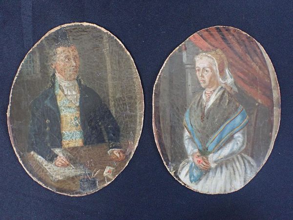 A PAIR OF NAIVELY PAINTED PORTRAITS OF A NAVAL CAPTAIN (?)