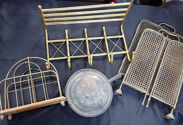 A TUBULAR BRASS COAT AND HAT RACK
