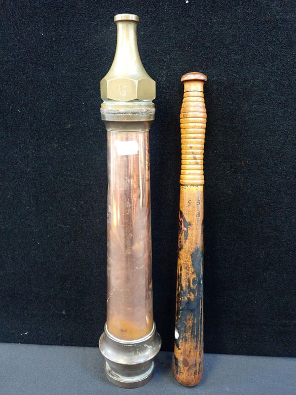 A COPPER AND BRASS FIRE HOSE NOZZLE