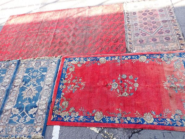 A RED GROUND ISFAHAN RUG