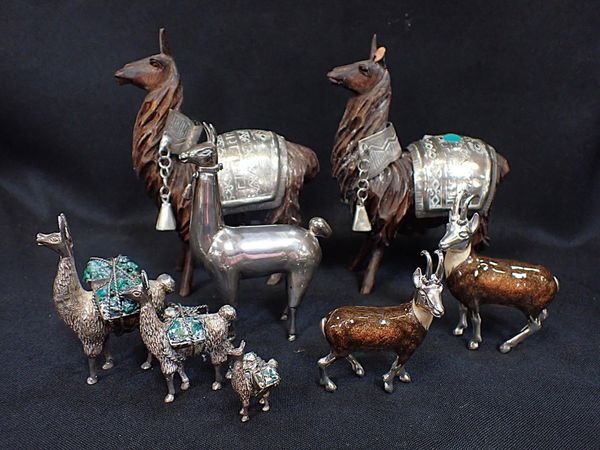 A WHITE METAL LLAMA