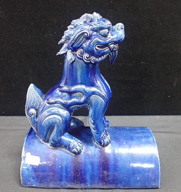 A BLUE-GLAZED CHINESE DRAGON ROOF TILE