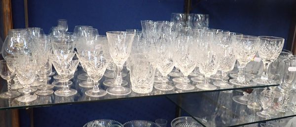 A QUANTITY OF CUT GLASS DRINKING GLASSES