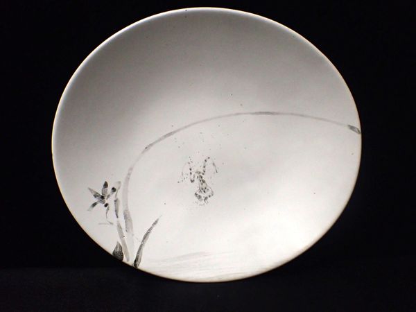 AN OVAL DISH BY ROGER LAW AT DARTINGTON