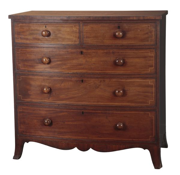 A REGENCY MAHOGANY AND SATINWOOD STRUNG BOWFRONT CHEST OF DRAWERS