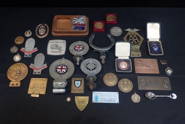 A COLLECTION OF CAR MASCOTS