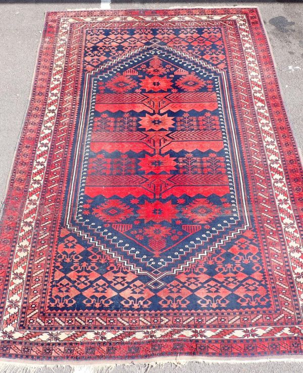 A LARGE BELOUCH RUG