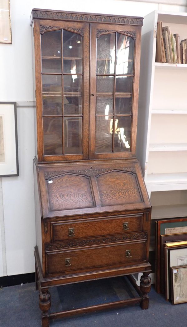 A 1920s OAK BUREAU BOOKCASE