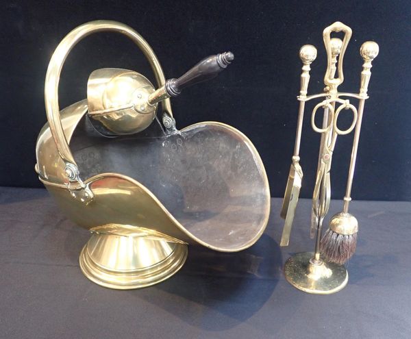 A BRASS COAL SCUTTLE AND SHOVEL
