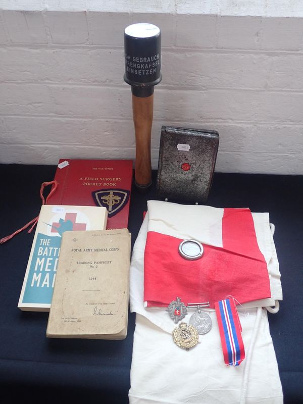 TWO RED CROSS FLAGS AND WAR OFFICE FIELD SURGERY POCKET BOOK