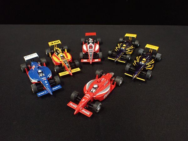 SIX UNBOXED SCALEXTRIC 'INDY' RACING CARS