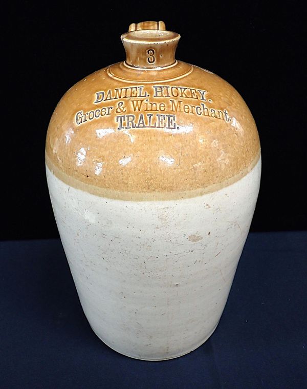 A LARGE STONEWARE FLAGON: 'DANIEL HICKEY, TRALEE