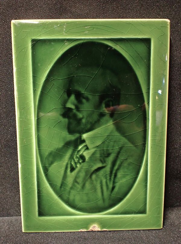 A POOLE/CARTERS PLAQUE DEPICTING CHARLES VAN RAALT