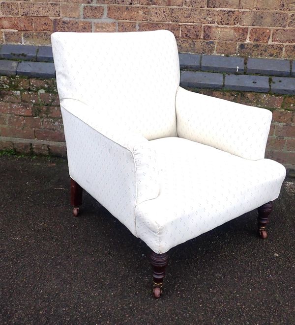 A LATE VICTORIAN SQUARE-BACK ARMCHAIR