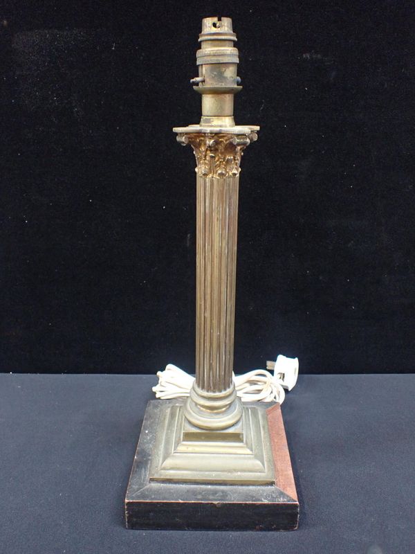 A BRASS CORINTHIAN COLUMN STYLE LAMP