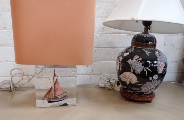 A MODERN TABLE LAMP, THE BASE WITH A MODEL BOAT