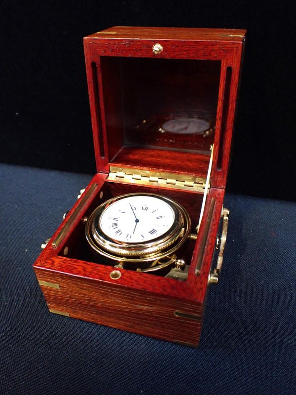 A MINIATURE SHIP'S STYLE CLOCK BY JEAN ROULET