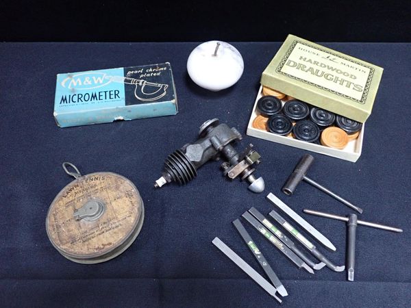 A SMALL VINTAGE MODEL ENGINE