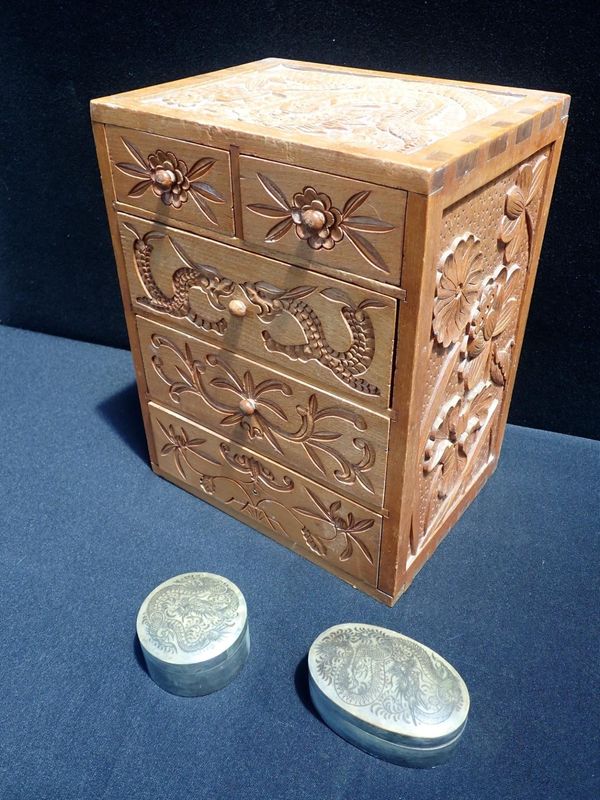 A FAR EASTERN CARVED TABLE CHEST