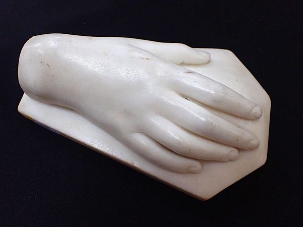 A 19th CENTURY CARVED MARBLE MODEL HAND