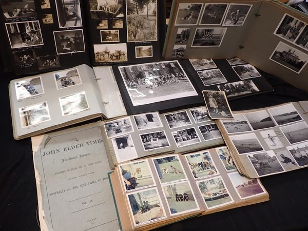 A COLLECTION OF OLD FAMILY PHOTO ALBUMS