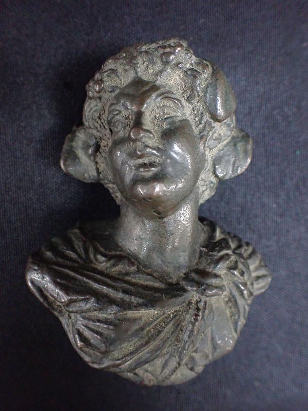 A GRAND TOUR BRONZE HEAD OF THE YOUNG BACCHUS