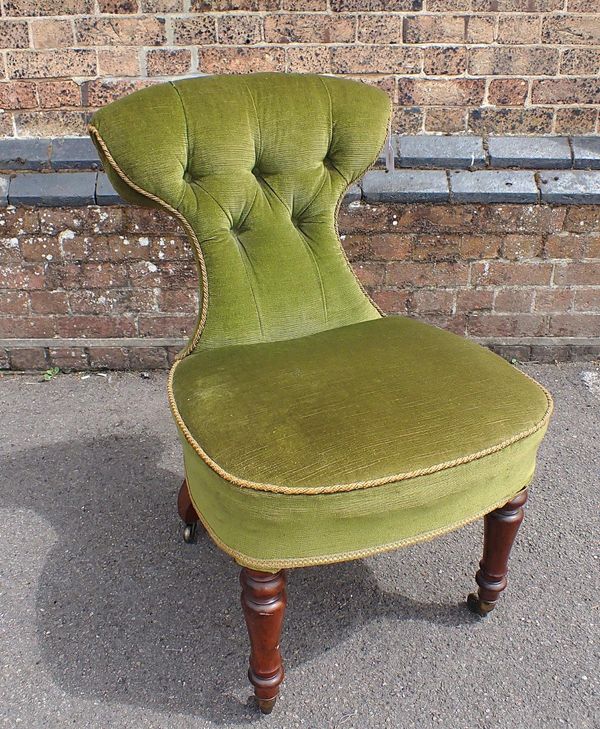 A VICTORIAN NURSING CHAIR BY HOLLAND & SON