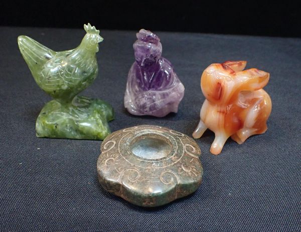 FOUR CARVED ORNAMENTS