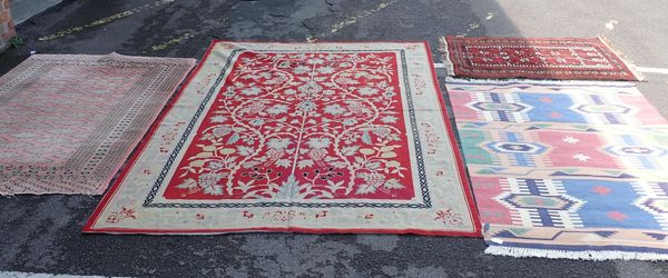 A PINK  GROUND BOKHARA RUG