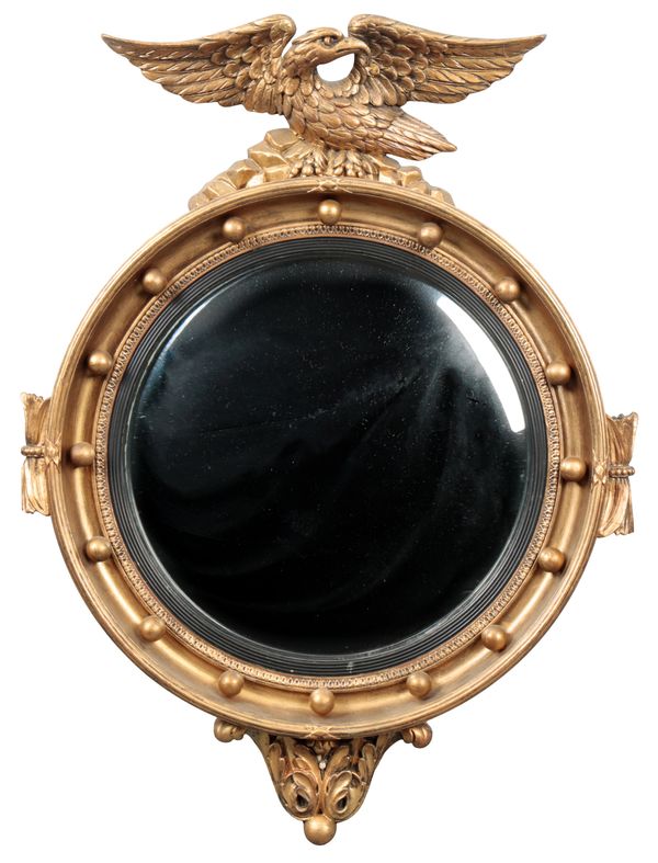 AN EMPIRE STYLE GILTWOOD CONVEX MIRROR