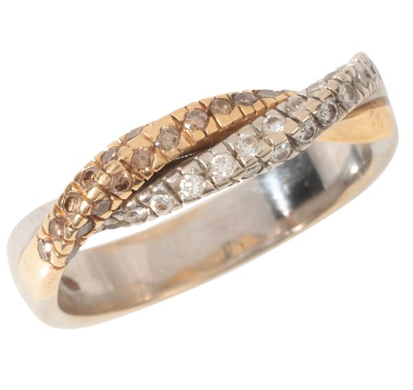 A STYLISED TWO TONE DIAMOND RING