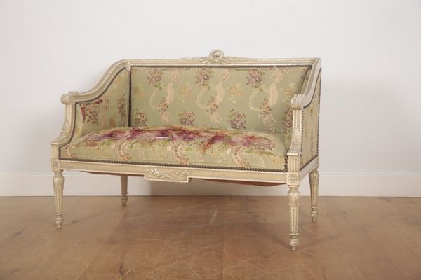 A SMALL LOUIS XVI STYLE WHITE-PAINTED SOFA