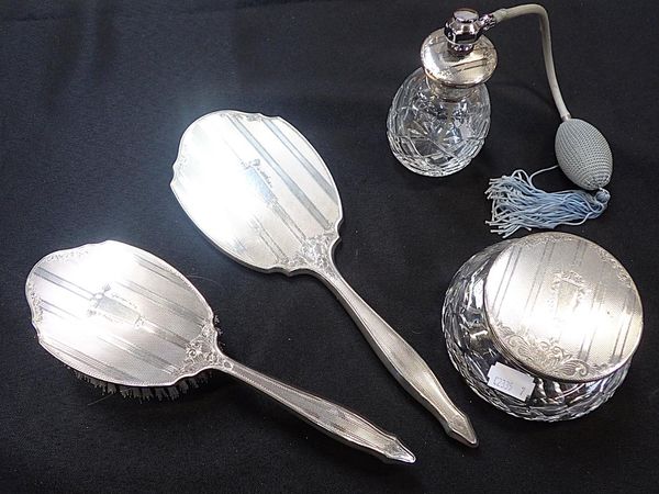 A HALLMARKED SILVER DRESSING TABLE BRUSH AND MIRROR