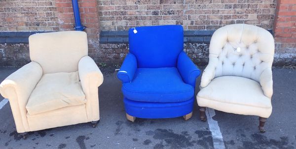 A HOWARD STYLE UPHOLSTERED ARMCHAIR