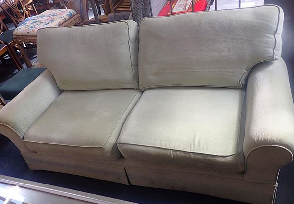 A LAURA ASHLEY TWO-SEATER SOFA