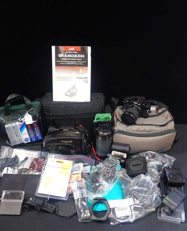 A JVG CAMERA RECORDER GR-AX63/AX43 AND AN OLYMPUS OM-2 FILM CAMERA