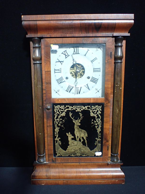 A SETH THOMAS SHELF OR WALL CLOCK