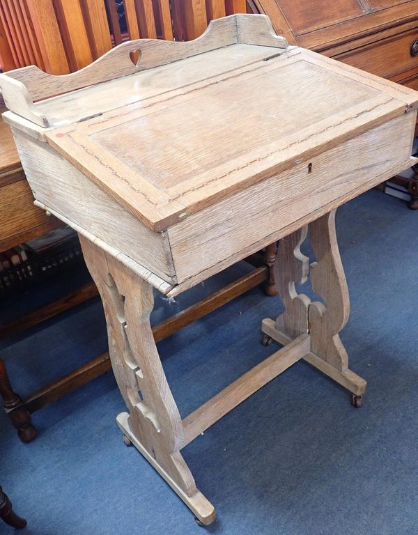 AN EDWARDIAN OAK DESK