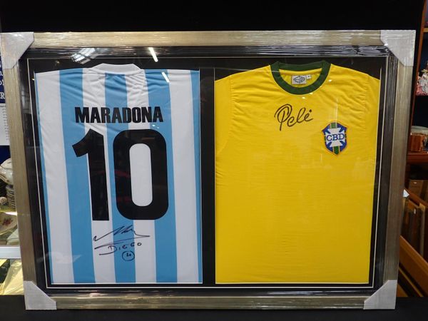 'PELE' AND 'MARADONA' DOUBLE PRESENTATION FRAMED SIGNED SHIRTS