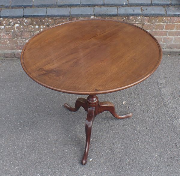 A GEORGE III MAHOGANY TILT TOP TABLE