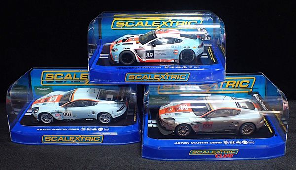 THREE BOXED SCALEXTRIC 'ASTON MARTIN' CARS