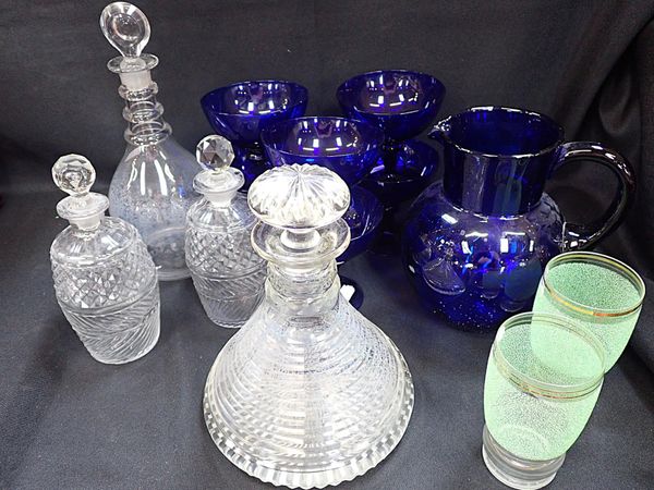 A PRISM-CUT GLASS SHIP'S DECANTER