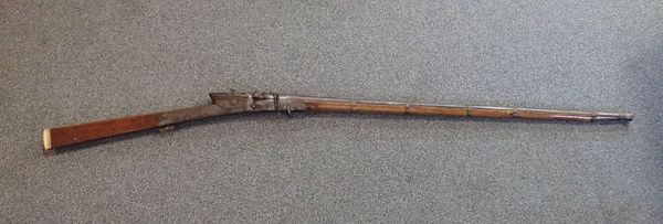 LONG BARRELLED INDIAN GUN