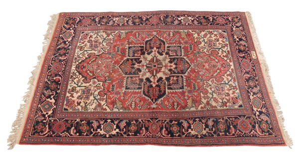A NORTH WEST PERSIAN HERIZ STYLE RUG