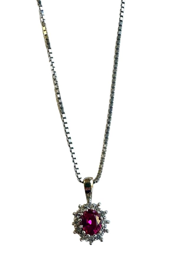 A 9CT WHITE GOLD, RUBY AND DIAMOND CLUSTER PENDANT