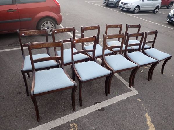 A SET OF TEN REPRODUCTION REGENCY STYLE MAHOGANY DINING CHAIRS