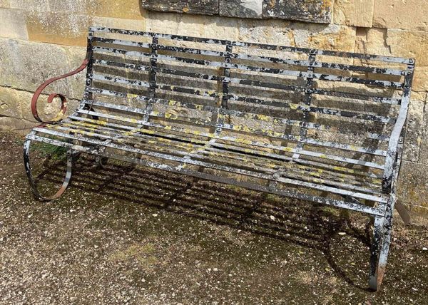 A VICTORIAN WROUGH IRON GARDEN BENCH