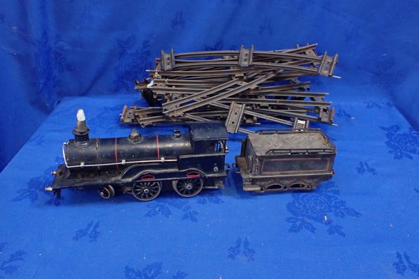 A MARKLIN TIN PLATE BRITISH PROFILE LOCOMOTIVE AND TENDER