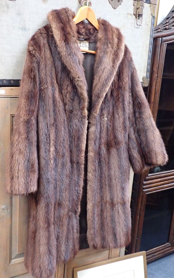 A FUR COAT: 'SIBERIAN FUR CO. LTD. BELFAST'